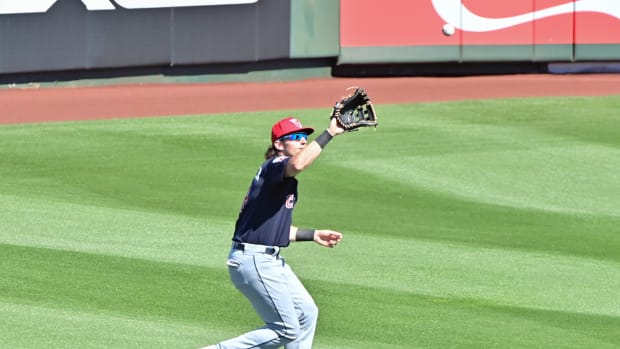 Feb 29, 2024; Tempe, Arizona, USA; Cleveland Guardians right fielder Chase DeLauter (6) catches a fly ball in the third inning against the Los Angeles Angels during a spring training game at Tempe Diablo Stadium.